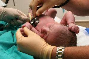 Doctor check up newborn baby